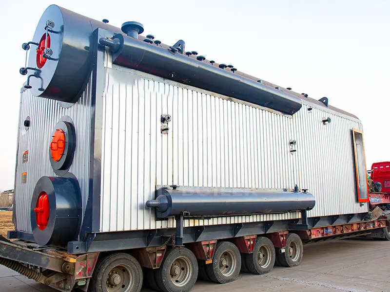 What is difference between water tube and fire tube boiler?